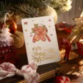 Gold foil Christmas greeting card with gingerbread man and festive die-cut detail - Christmas Gingerbread Man