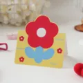 Tarjeta de felicitación amarilla para niños con un lindo diseño de flores rojas para regalo - Flor [Tarjeta de Dibujos Animados]