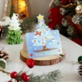 Cute blue cartoon Christmas greeting card with festive tree and Merry Christmas lettering - Style 5