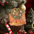 Festliche Weihnachts-Goldfolien-Grußkarte mit Kranzdesign auf warmem Holzboden - Blumengirlande