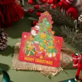 Festive red Christmas greeting card featuring a detailed tree and snowman design - Christmas Tree Style 9