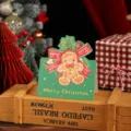 Vintage green Christmas greeting card featuring a cute gingerbread man illustration - Gingerbread Man