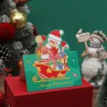 Tarjeta de Navidad retro con diseño de muñeco de nieve y trineo en caja de regalo - Estilo de Muñeco de Nieve de Navidad
