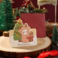 Cute reindeer-style Christmas greeting card with red envelope and festive props background - Christmas Elk Gift / Single Piece (With Envelope)