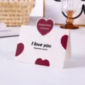 Tarjeta de regalo blanca minimalista con corazón burdeos y texto 'I love you' - Estilo Corazón