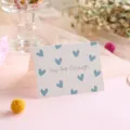 Minimalist white greeting card with blue heart pattern and "You Are Enough" text. - You Are Enough Style