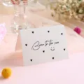 Minimalist white greeting card featuring 'Born to the sun' text and heart pattern print - Born To The Sun Style