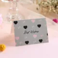 Minimalist gray greeting card featuring pink hearts and bows for various occasions - Best Wishes Style