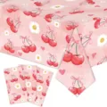 Detailed view of cherry and daisy pattern on disposable pink tablecloth and napkins. - Cherry Tablecloth / 1 Sheet