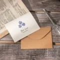 Vintage kraft paper greeting card with Good Luck clover print and matching brown envelope - Clover Style