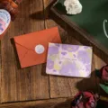 Tarjeta de felicitación floral en acuarela romántica con texto y sobre naranja rústico - Te Extraño (Te Extraño Con Sobre) / 1 Hoja