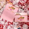 Creative pink Christmas greeting cards featuring gold stamped Merry Christmas text. - Christmas Gift Style