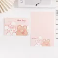 Joli ensemble de papeterie rose comprenant une enveloppe et du papier à lettres illustrés - Bonne Journée
