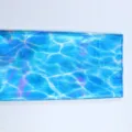 Nappe de fête laser bleu à ondulations d'eau en film d'aluminium réfléchissant jetable - 137*274cm / Vague Bleue