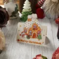 Tarjeta de regalo de Navidad vintage con ilustración de casita de jengibre y un muñeco de nieve - Colección de Navidad - Casa de Jengibre
