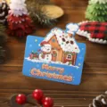 Bonita tarjeta de Navidad azul con un muñeco de nieve y una casita de jengibre - Casa de Jengibre Muñeco de Nieve