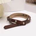 Vintage brown Y2K studded leather belt with snap buttons and punk style rivets - 103cm / Coffee