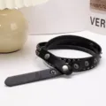 Stylish black Y2K punk leather belt decorated with silver rivets and metal snap buttons - 103cm / Black