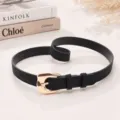 Elegant black textured leather belt for women with a vintage-style gold buckle - Black