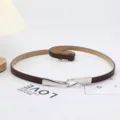 Thin dark brown leather belt with interlocking silver hook buckle for women's dresses. - Coffee
