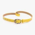 Une ceinture fine jaune élégante pour femme avec pois blancs et boucle argentée - Jaune