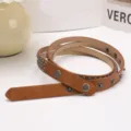 Vintage Y2K punk style brown leather belt featuring silver metal rivets and snap button closure - 103cm / Camel