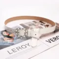 Elegant white leather belt for women featuring a unique heart-shaped chain buckle detail - White