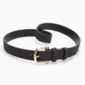 Elegant women's black woven belt featuring a stylish gold horseshoe buckle for jeans - Black