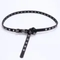 Punk style black faux leather belt with full metal grommets and classic silver buckle - Black