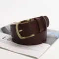 Women's vintage coffee brown leather belt featuring a classic brass pin buckle design - Coffee