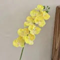 Vibrant yellow artificial Phalaenopsis orchid stem with nine realistic flower heads - Yellow