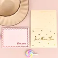 Eleganti biglietti di auguri bronzati in rosa e crema con testo 'Just Love You'. - Stile Solo Amarti / Busta + Sacchetto OPP