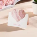 Elegant white greeting card with a pink marble heart and Best wishes print on it - Gilded Dream