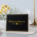 Tarjeta de felicitación negra con texto dorado Wish you all the best y corazón. - Everything Is The Best Arrangement