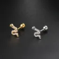 Close-up view of elegant snake-shaped cartilage stud earrings in gold and silver finishes - Snake Style (CC017)