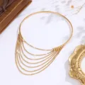 Dettaglio elegante bracciale da braccio aperto nappe multistrato oro 18k - Oro Stile C