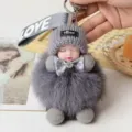 Cute fluffy pom-pom sleeping baby doll keychain, soft plush bag pendant and car charm accessory. - Gray (14cm / 37g)
