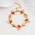 Elegante armband in Franse stijl met kleurrijke emaille harten en vlinders goudkleur 18k - Veelkleurige Vlinder Hart Stijl (CXB1356-B)