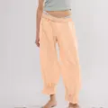 Light orange casual corduroy pants for women, featuring an elastic waist and cute ruffle cuffs. - S / Bottoms / Light Yellow