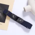 Closeup of elastic buckle-free lazy belt with blue stretch band and black snap leather tabs. - Navy Blue