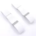 Close up details of white elastic shirt sleeve garters with metal clips and adjustable loops. - White