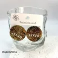 Detailed view of gold stainless steel LOVE earrings with size and weight specs - LOVE Hammered Round (ES827) / Gold