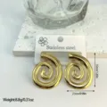 Macro view of gold-tone stainless steel spiral earrings with size and weight annotations - Spiral Geometric Swirl Style (ES840)