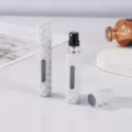 Detail view of portable pearl perfume atomizer bottle, 6ml refillable spray bottle with clear window. - White Pearl Style / White