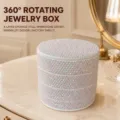 Detailed view of the 4-layer rotating rhinestone jewelry box showing sparkling AB crystal cover. - Without Pattern / White Jelly No Pattern
