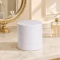 Detail view of a 4-layer rotating white jewelry storage organizer on an elegant marble vanity. - Solid Color Without Rhinestone Style / White No Rhinestone
