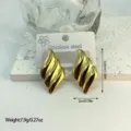 Detailed view of gold striped stainless steel earrings with dimensions 3.65cm by 2cm - Spiral Fluid Texture Geometric Style (ES850)