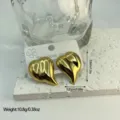 Elegant heart shaped striped stainless steel stud earrings in premium gold finish for women - Radial Striped Geometric Heart (ES862)