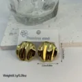 Golden geometric striped stainless steel stud earrings in modern minimalist style - Striped Wave Round (ES88)