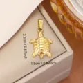 Gold turtle pendant in durable stainless steel, marine style charm measuring 2.2x1.5 cm. - Sea Turtle (0145) / 2.2x1.5cm